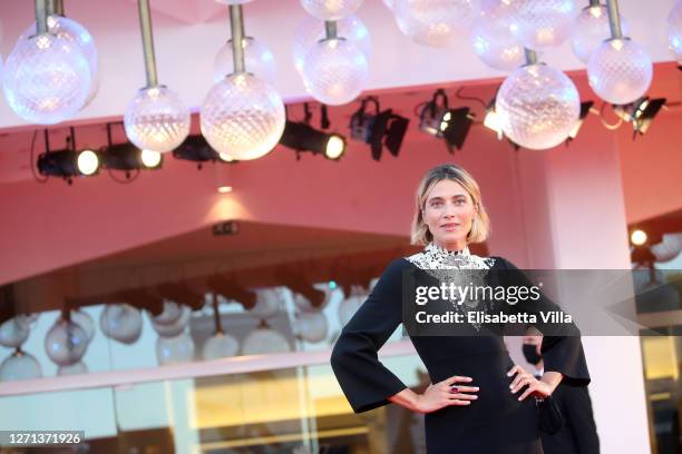 Festival Hostess Anna Foglietta walks the red carpet ahead of the movie "Notturno" at the 77th Venice Film Festival on September 08, 2020 in Venice,...