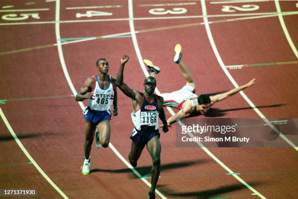 Allen Johnson of the United States of America winning the Men's 110m hurdle final followed by Colin Jackson of Great Britain and Florian Schwarthoff...