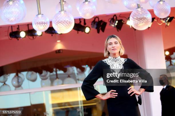 Festival Hostess Anna Foglietta walks the red carpet ahead of the movie "Notturno" at the 77th Venice Film Festival on September 08, 2020 in Venice,...