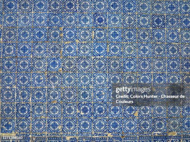blue and white azulejos on the wall of a portuguese house - azulejos stock pictures, royalty-free photos & images