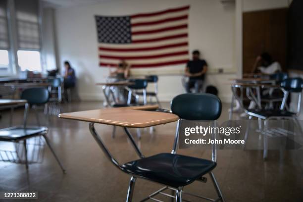 Students attend a socially-distanced class on the first day of school at Stamford High School on September 08, 2020 in Stamford, Connecticut....