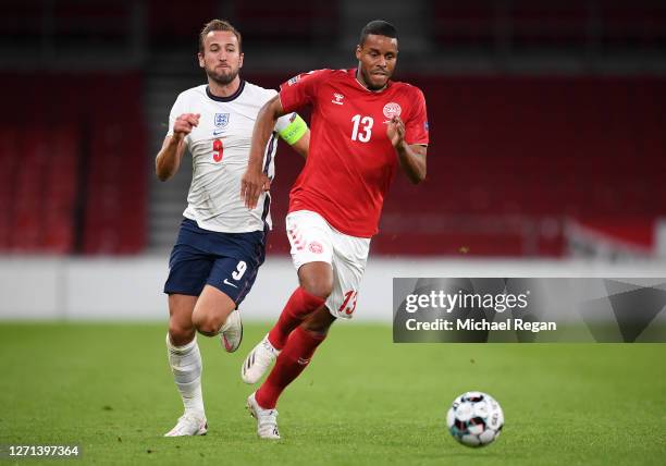 Harry Kane of England chases down Mathias Jorgensen of Denmark during the UEFA Nations League group stage match between Denmark and England at Parken...