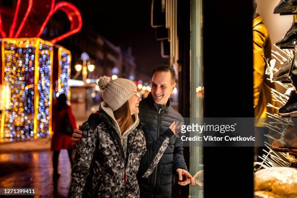 couple spend time in shopping - boxing day stock pictures, royalty-free photos & images