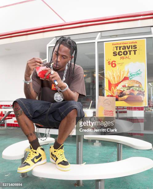 Travis Scott surprises crew and customers at McDonald's for the launch of the Travis Scott Meal on September 08, 2020 in Downey, California.