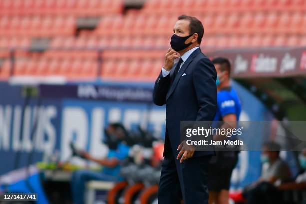 Jose Guadalupe Cruz, Head Coach of Necaxa looks on during the 9th round match between Atletico San Luis and Necaxa as part of the Torneo Guard1anes...