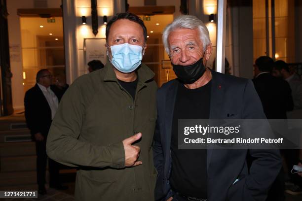 Arthur Essebag and Gilbert Coullier attend Doctor Roland Levy bids farewell to his "Stars of Patients" on September 08, 2020 in Paris, France.