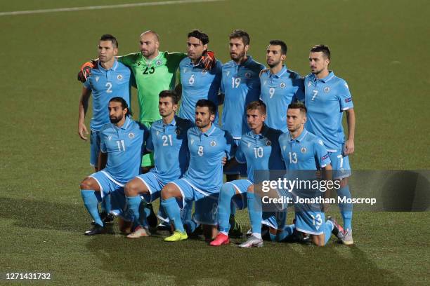 The San Marino starting eleven line up for a team photo before kick off, back row ; Dante Carlos Rossi, Elia Benedettini, Davide Simoncini, Luca...