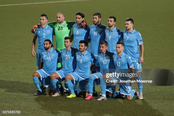 The San Marino starting eleven line up for a team photo before kick off, back row ; Dante Carlos Rossi, Elia Benedettini, Davide Simoncini, Luca...