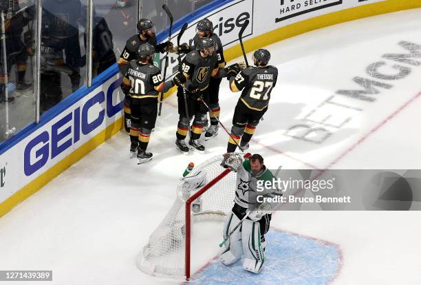Tomas Nosek of the Vegas Golden Knights celebrates with his teammates after scoring a goal on Anton Khudobin of the Dallas Stars during the second...