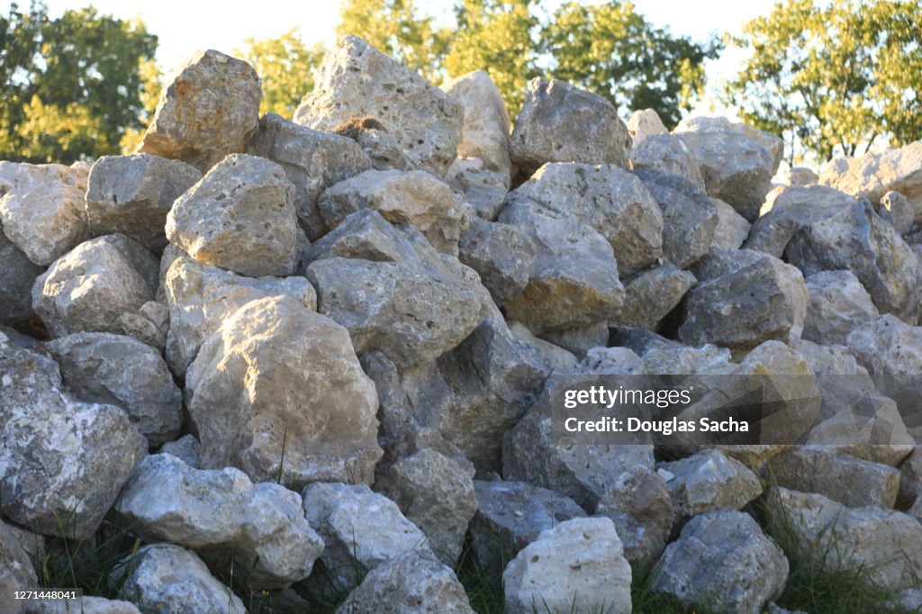 Boulder rocks piled for a retaining wall