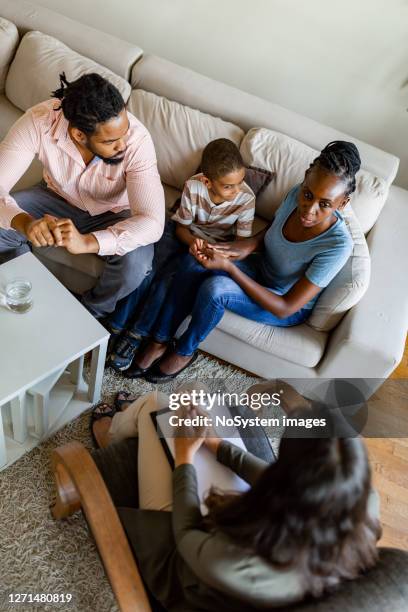 family on a mental health therapy session - child psychologist stock pictures, royalty-free photos & images