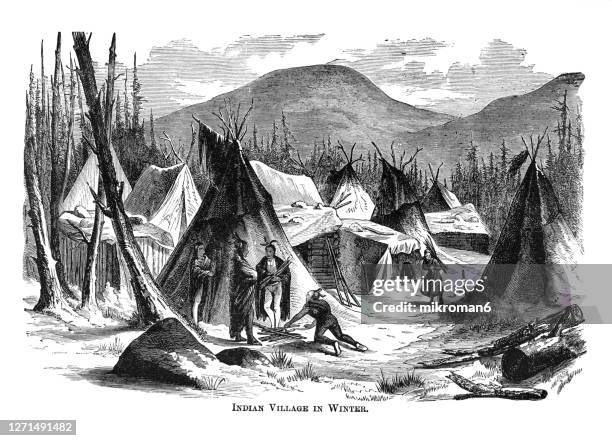 old engraved illustration of indian, native american village in winter time - village life stockfoto's en -beelden