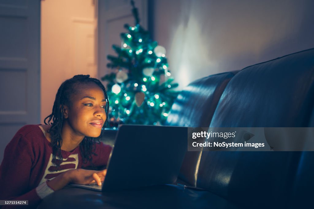 Woman online buying Christmas gifts