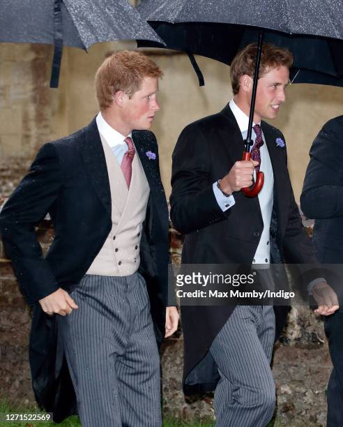 Prince Harry and Prince William attend the wedding of Tom Parker Bowles and Sara Buys at St Nicholas Church on September 10, 2005 in Rotherfield...