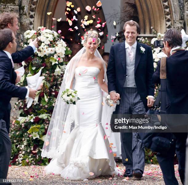 Sara Buys and Tom Parker Bowles are showered in confetti as they depart after their wedding at St Nicholas Church on September 10, 2005 in...