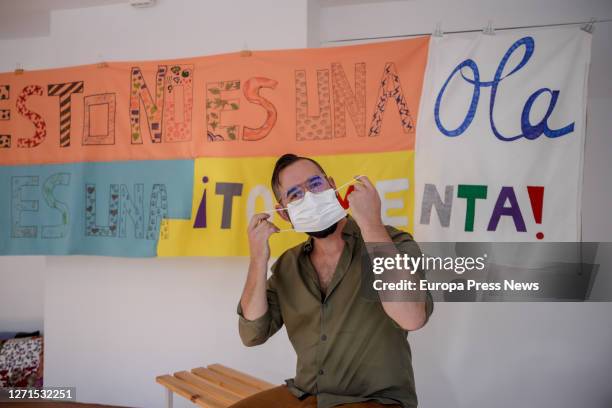 Christian Fernández Mirón, curator of the exhibition 'Del todo imposible', during the presentation of the show at the Sala de Arte Joven, on...