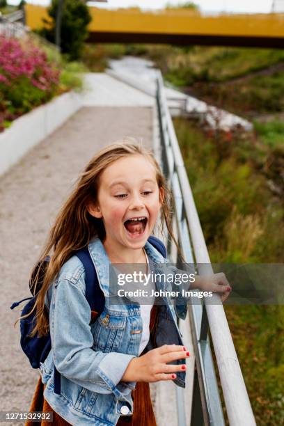 happy girl looking away - messestand bildbanksfoton och bilder