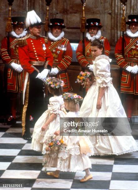 Bridesmaids Clementine Hambro, Catherine Cameron and Lady Sarah Armstrong-Jones attend the wedding of Prince Charles, Prince of Wales and Diana,...