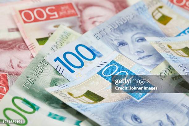 swedish money in different values - kronas stock pictures, royalty-free photos & images