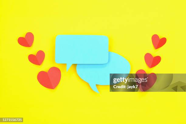 love talk - jayk7 origami stock pictures, royalty-free photos & images