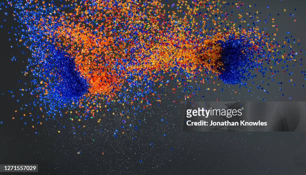 blue and orange beads - london spring stockfoto's en -beelden