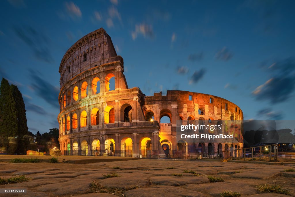 Colosseum in Rome at night with lights on
