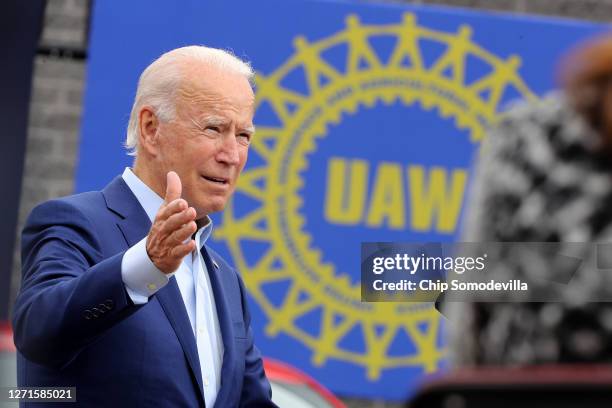 Democratic presidential nominee and former Vice President Joe Biden delivers remarks in the parking lot outside the United Auto Workers Region 1...