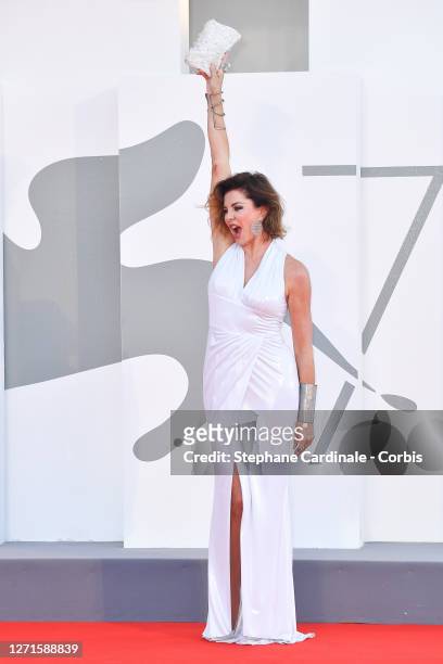 Alba Parietti walks the red carpet ahead of the movie "Le Sorelle Macaluso" at the 77th Venice Film Festival on September 09, 2020 in Venice, Italy.