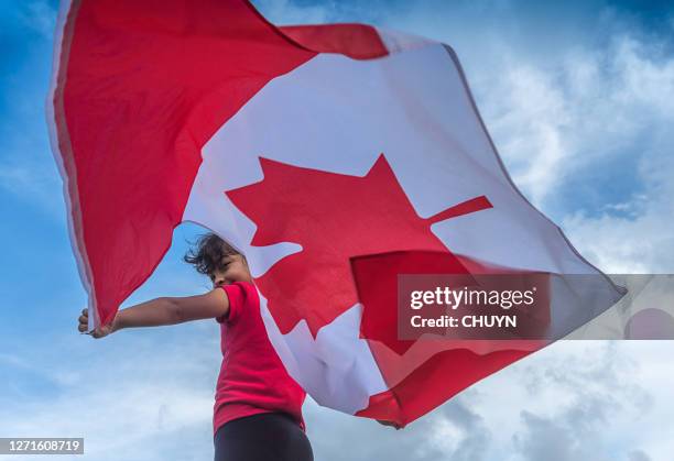 canadian pride - canadians celebrate national day of independence stock-fotos und bilder