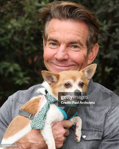 Actor Dennis Quaid poses with a rescue dog on the set of Hallmark Channel's "Home & Family" at Universal Studios Hollywood on September 09, 2020 in...