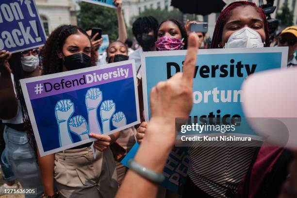 Pro Affirmative Action supporters and and counter protestors shout at each outside of the Supreme Court of the United States on Thursday, June 29,...