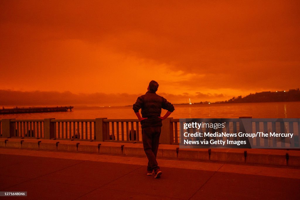 Red-Orange Skies from the Northern California Wildfires Blanket San Francisco Bay Area
