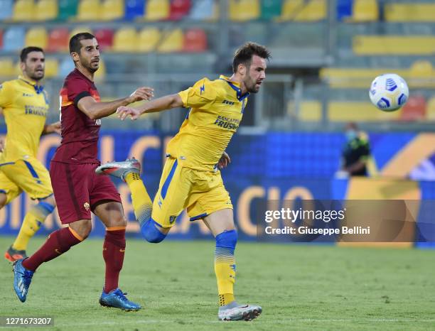 Henrikh Mkhitaryan of AS Roma and Przemyslaw Szyminski of Frosinone Calcio in action during the Pre-Season friendly match between Frosinone Calcio...