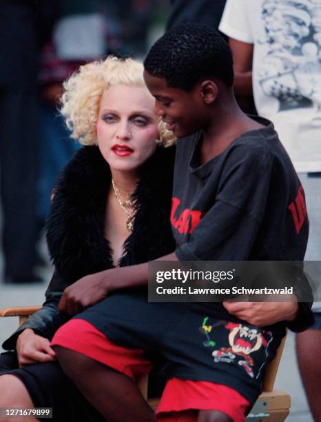 Madonna filmed "Secret" music video, on the streets of Harlem, NYC.