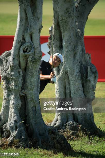 Li Haotong of China plays a on the 9th hole during Day One of the Portugal Masters at Dom Pedro Victoria Golf Course on September 10, 2020 in...