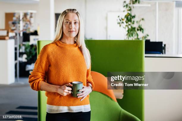 portrait of office employee with coffee - bright portrait stock pictures, royalty-free photos & images