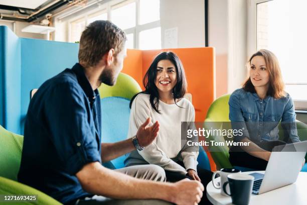 meeting between three team leaders in office - new business stock pictures, royalty-free photos & images
