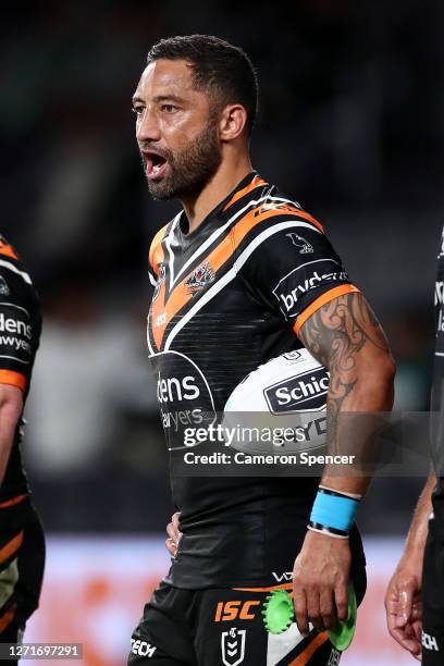 Benji Marshall of the Tigers looks on after a Rabbitohs try during the round 18 NRL match between the Wests Tigers and the South Sydney Rabbitohs at...