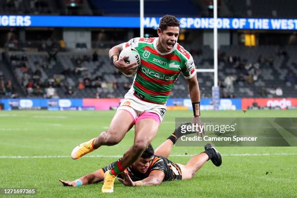 Dane Gagai of the Rabbitohs scores a try during the round 18 NRL match between the Wests Tigers and the South Sydney Rabbitohs at Bankwest Stadium on...