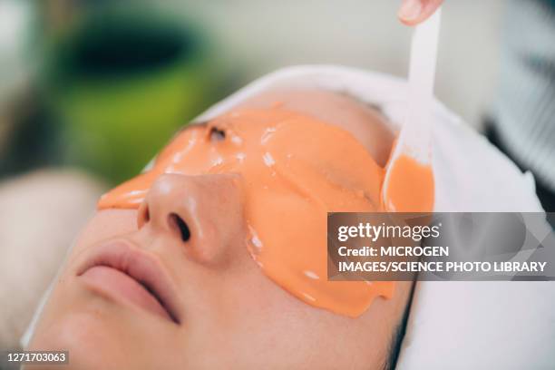 peel off facial mask treatment - peel off mask stock-fotos und bilder