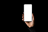 Person holding in hand smartphone with empty white screen