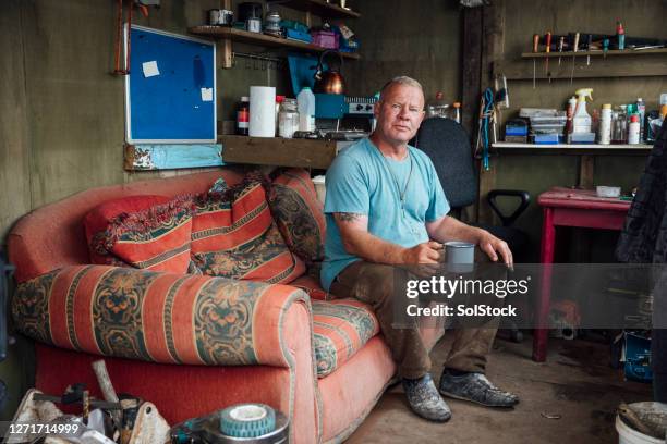 coffee break in the workshop - man shed stock pictures, royalty-free photos & images