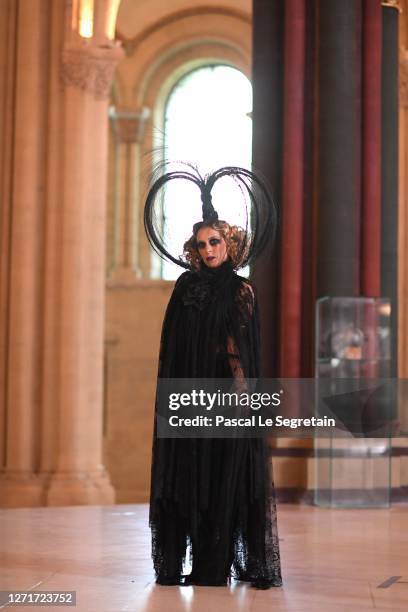 Ophelia Kolb poses for the "Il Medico Della Peste" 2020/2021 Winter Franck Sorbier Haute Couture Maitre collection at the Conservatoire national des...