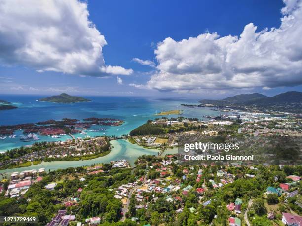 aerial view of mahe and eden island, seychelles - seychelles stock pictures, royalty-free photos & images