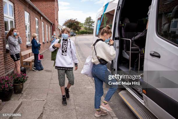 Students of Samsø Frie Skole enter the school bus after school on September 07, 2020 in Samso, Denmark. Samsø is a sandy, 114 square kilometers...