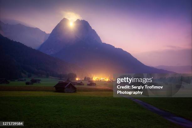 moon light above the mountain, night landscape in bavaria - bavaria village stock pictures, royalty-free photos & images