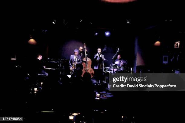 American saxophonist Johnny Griffin performs live on stage with trumpeter Roy Hargrove , pianist James Pearson, double bassist Reggie Johnson and...