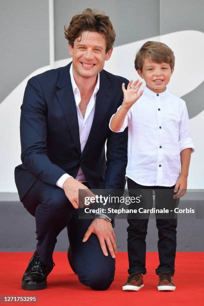 Michael Lamont and James Norton walk the red carpet ahead of the movie "Und Morgen Die Ganze Welt" at the 77th Venice Film Festival on September 10,...