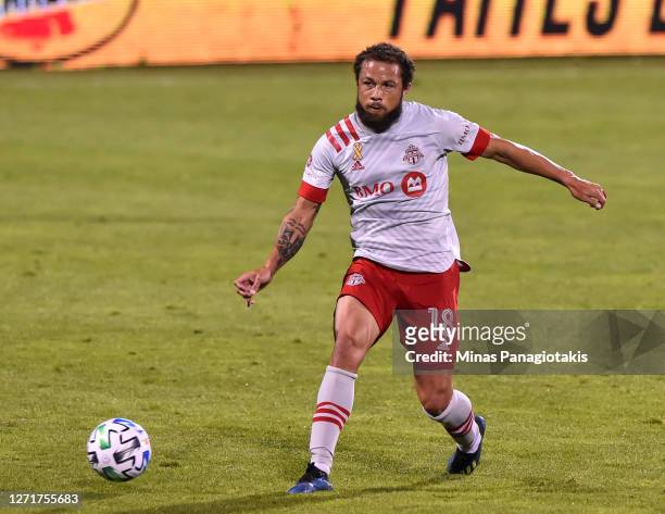 Nick DeLeon of Toronto FC runs for the ball against the Montreal Impact during the second half of the MLS game at Saputo Stadium on September 9, 2020...