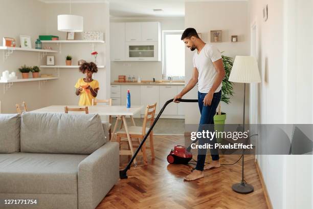 we believe that a clean home is a happy home - vacuum cleaner stock pictures, royalty-free photos & images
